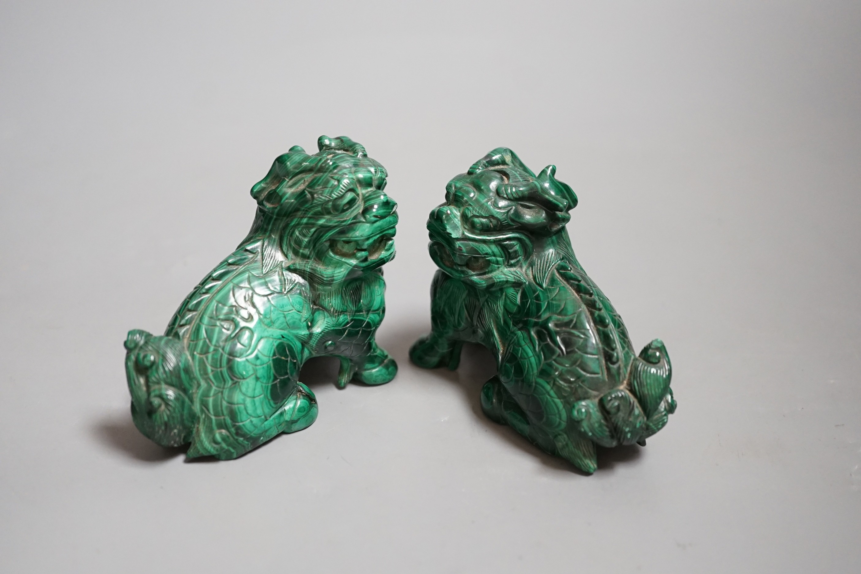 A pair of Chinese carved Lion-dog figures, 6.5cm tall